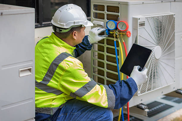 Professional Air Duct Cleaning technician working in Newburg, WI